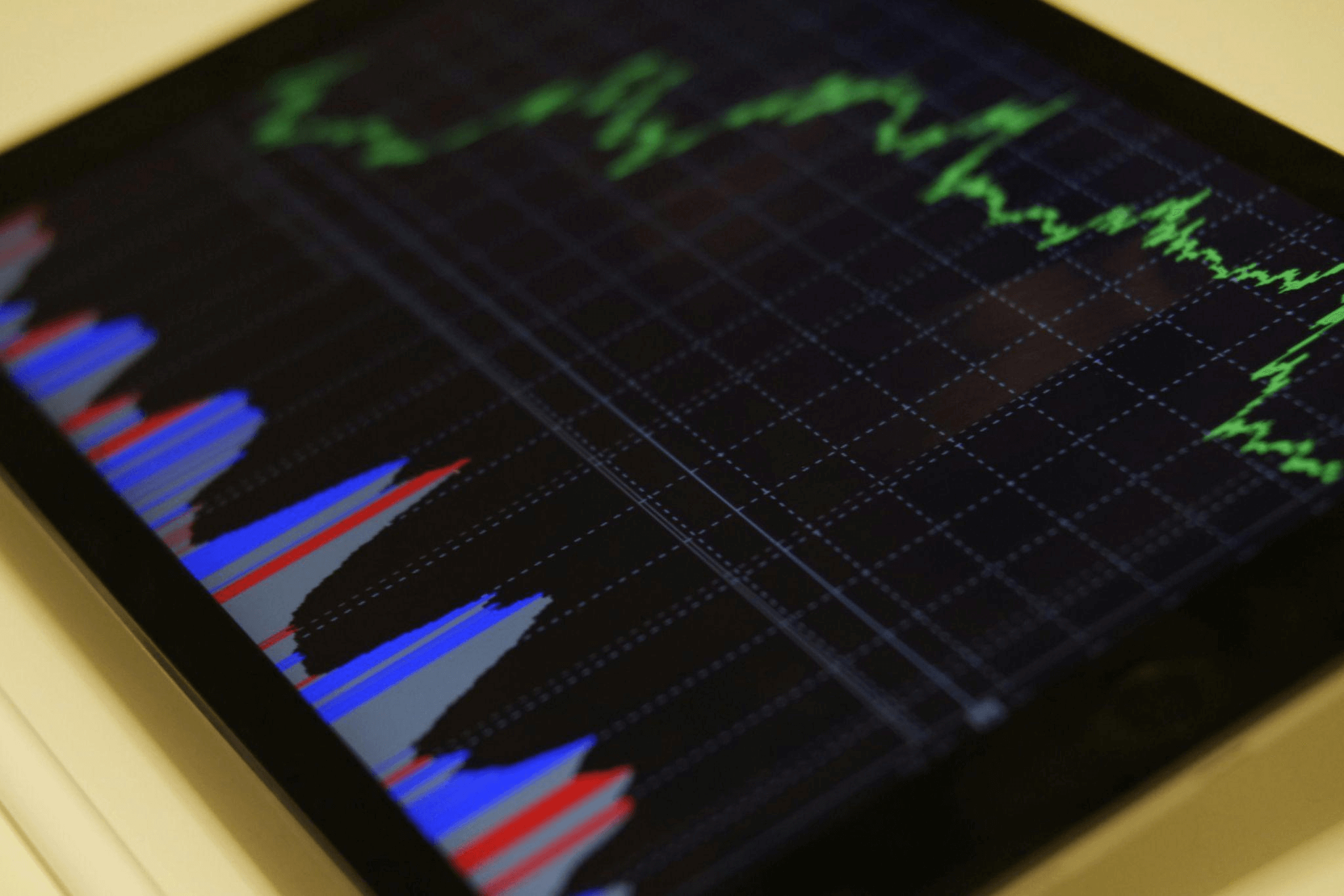 A black, blue, and red graph illustration showing data trends, symbolizing the importance of analyzing and optimizing performance as part of a blog content strategy.
