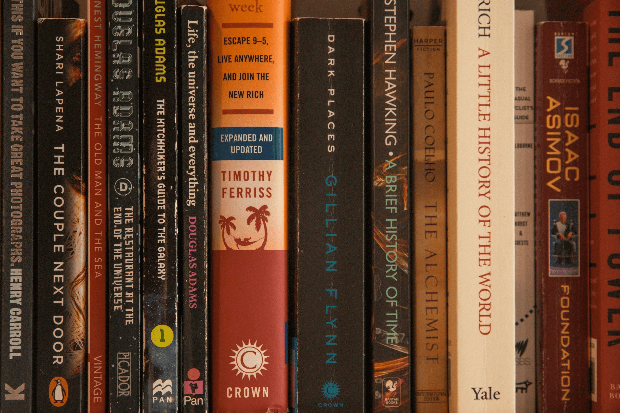 A shelf of self-published and traditionally published books.