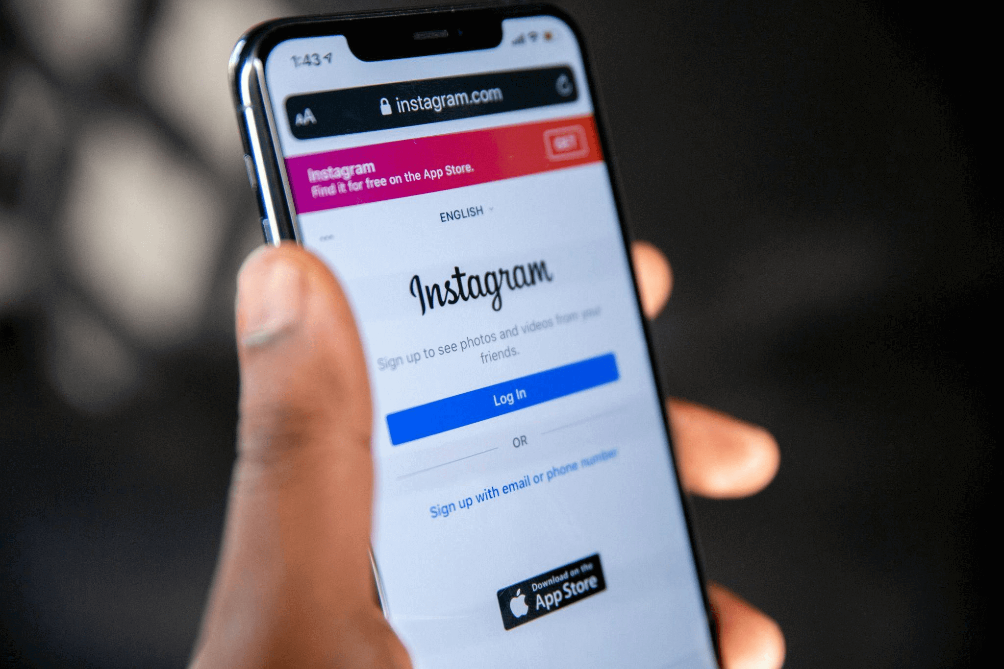 Person using smartphone to explore Instagram new features and updates in 2025.