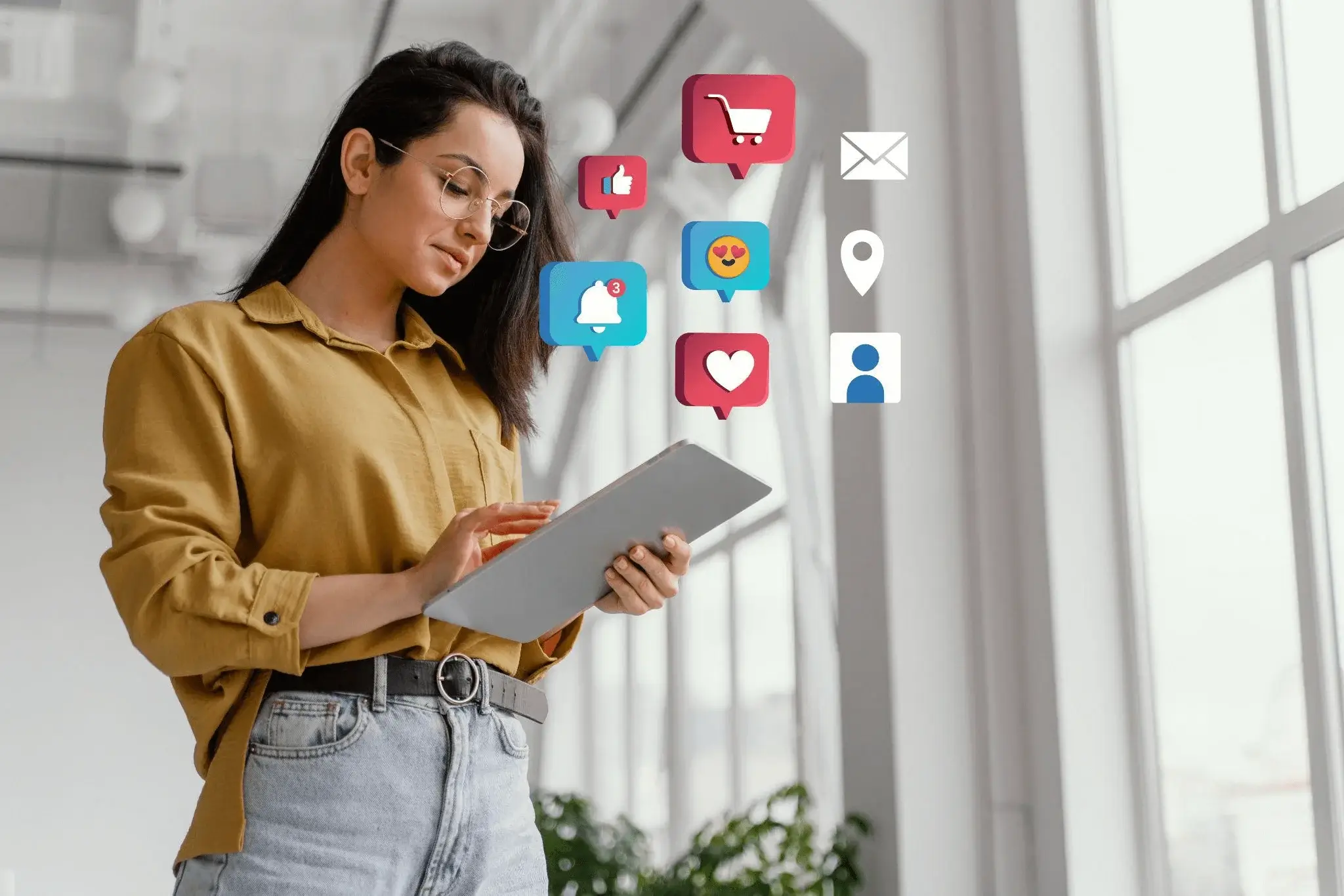 B2B social media marketing executive with a tablet and multiple platform icons and marketing applications suspended overhead