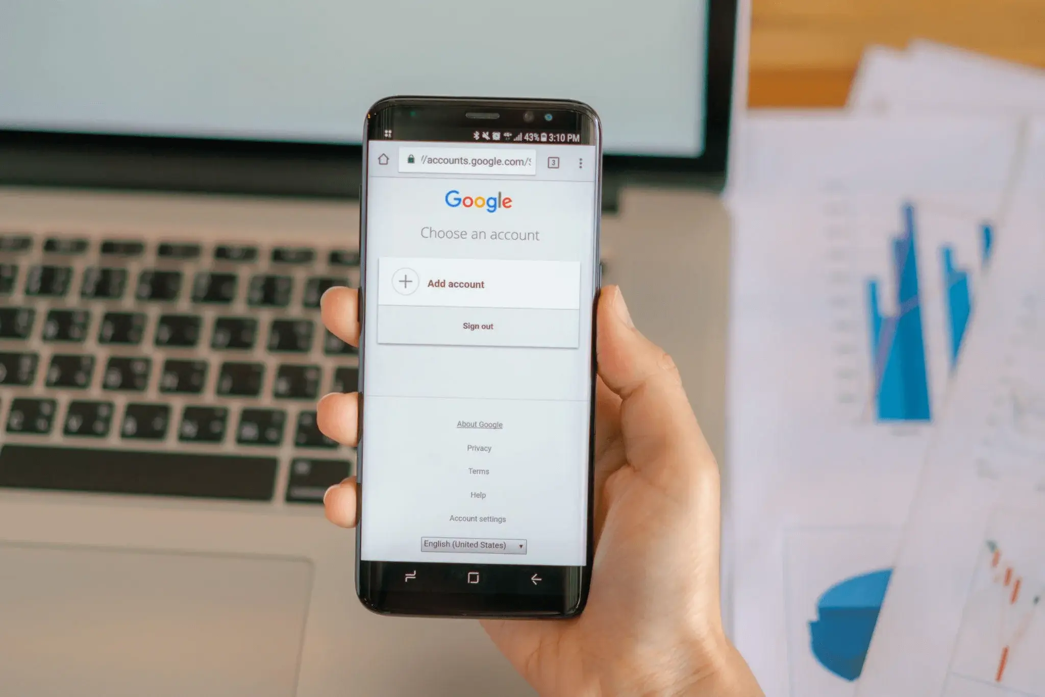 Hand holding a smartphone displaying the Google app, symbolizing the role of Google Ads AI in modern advertising integration.